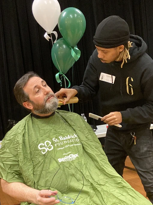 Principal Eric Juli shaves his beard to raise money for St. Baldrick's
