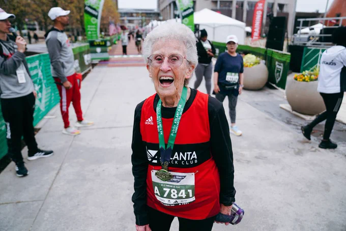 Betty Lindberg stands at the Publix Atlanta 5K finish line