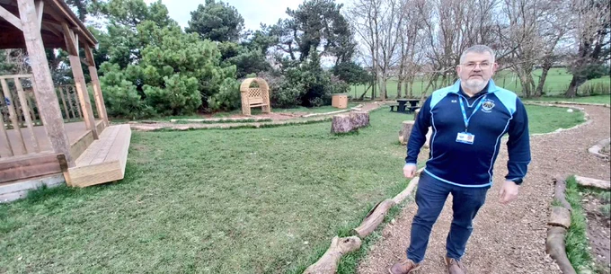 Mr Dorrian, Principal, pictured in the school's outdoor learning space 