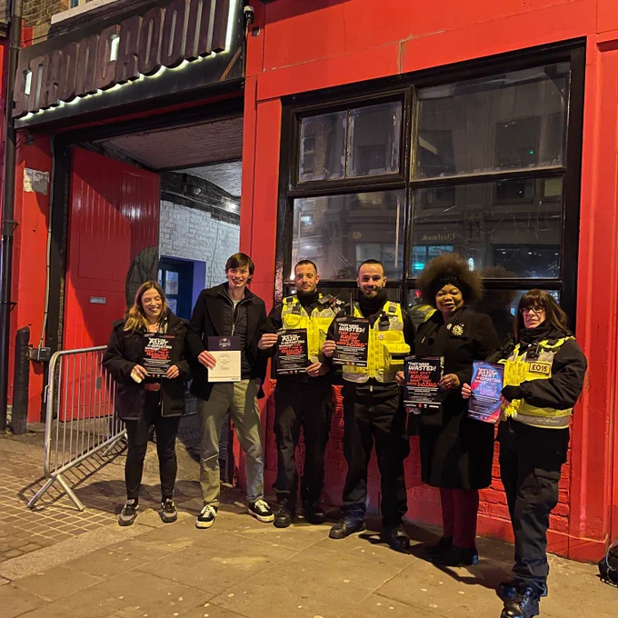 Hackney staff, Cllr Fajana-Thomas, enforcement officers outside a hackney venue in Shoreditch 