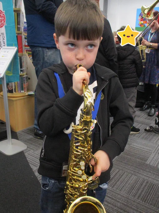 child with saxophone