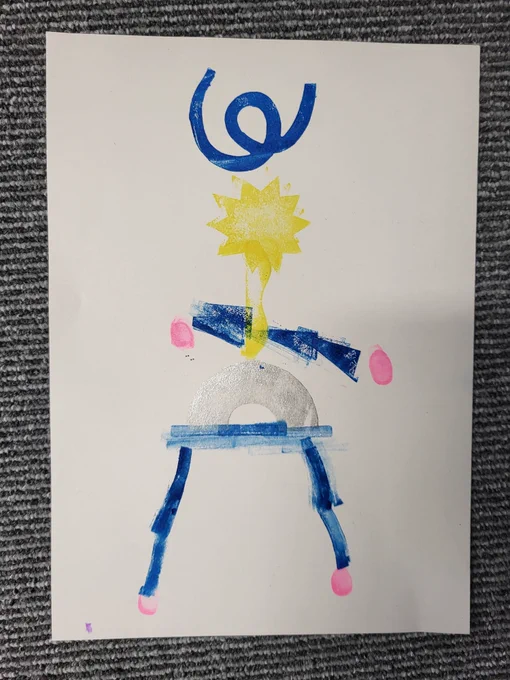 Blue, silver, yellow and pink stamping in an assortment of swirling and geometric shapes to create a skinny robot body