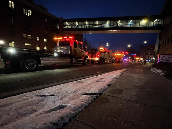 Responder trucks with lights outside of St. Luke's hospital to bring cheer to kids on Valentine's Day.