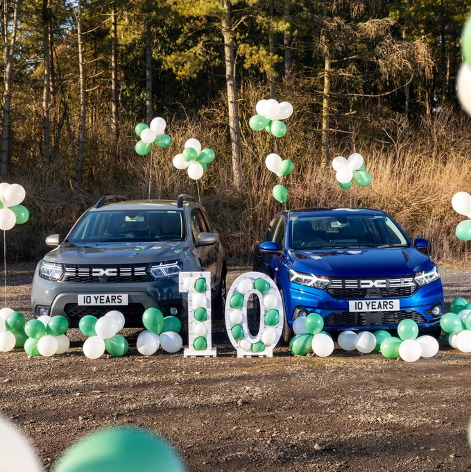 The Dacia Duster and Dacia Sandero surrounded by balloons, as the Dacia brand celebrates 10 years since its launch in the UK.