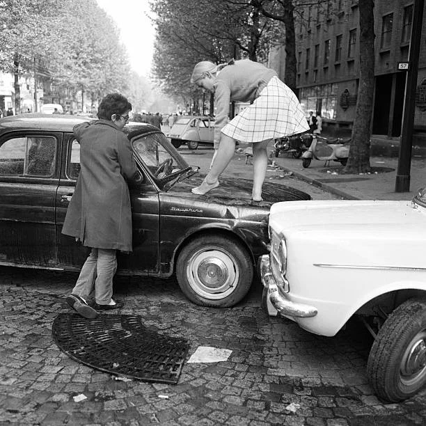 Car accident in Paris. Year 1968, black and white version 