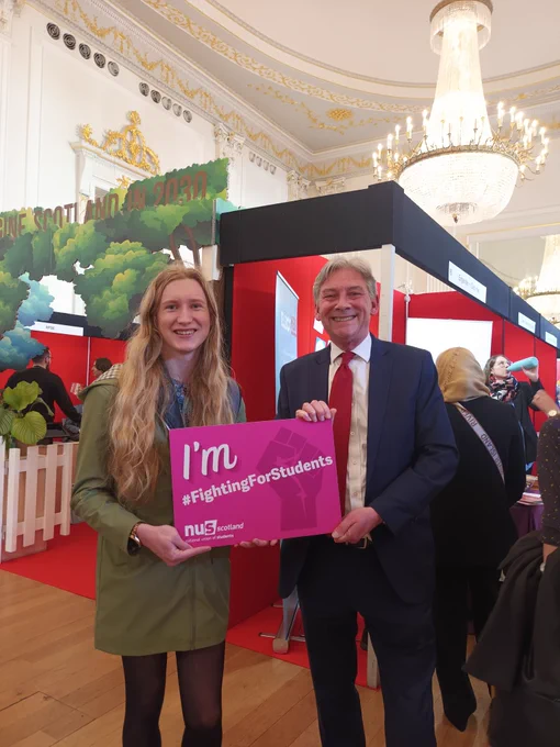 NUS President, Ellie, with MSP Richard Leonard with a our Fighting For Students sign