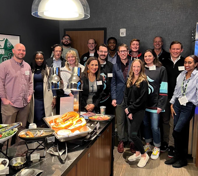 Sports Lawyers Association members and guests at the Seattle Kraken game on February 16, 2023. Photo taken in the Miller Nash suite at Climate Pledge Arena.