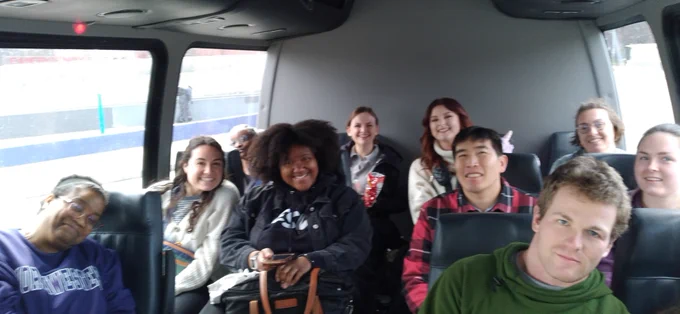 A group of students inside a bus.