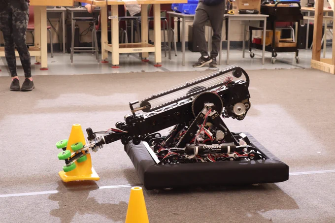 Our robot picking up a cone.