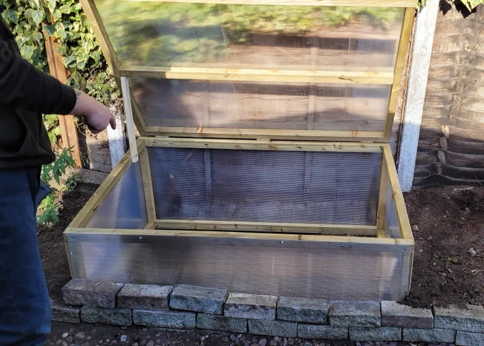 Frame finished, set in place with Mr Stef's arm pointing at it