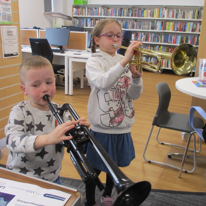 children playing brass instruments
