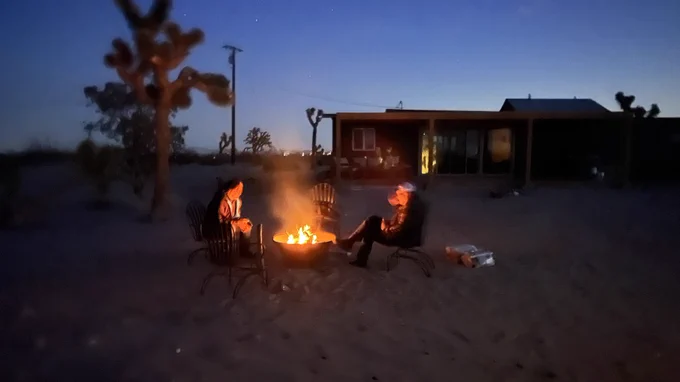 By the fire at sunset in the desert