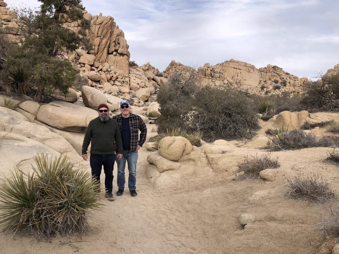 Mikhail and Jim hiking in Joshua Tree.