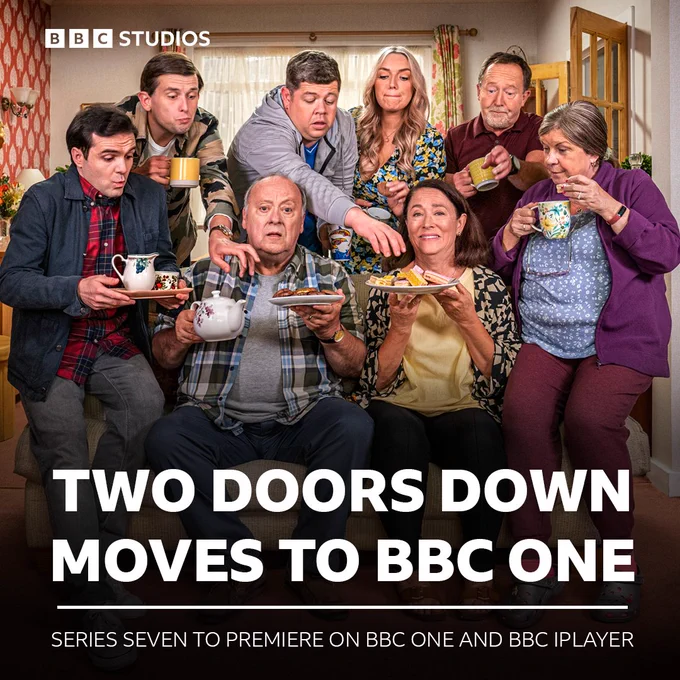 Composite image showing Image of all the main cast from Two Doors Down either looking at the camera or reaching for food overlaid with a BBC Studios logo and a caption reading “Two Doors Down Moves to BBC One, Series Seven to Premiere on BBC One and BBC iPlayer.”