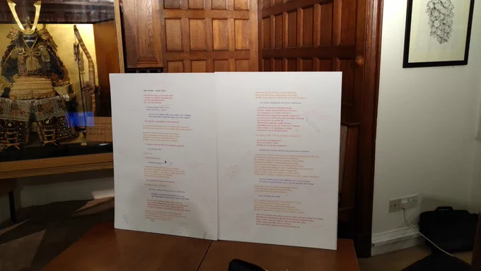 A1 printouts of Eulalia's poem Udon Noodles annotated with people's comments