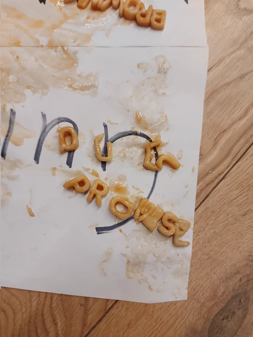 The word Promise spelt out in alphabetti spaghetti 