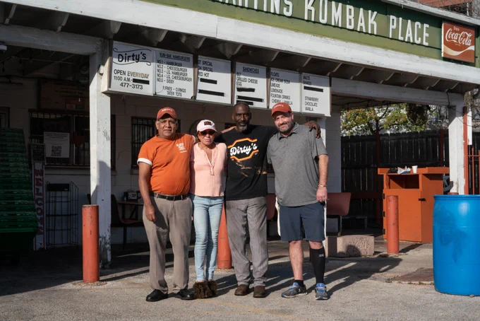 Staff standing outside of Dirty Martins. Photo by Kennedy Weatherby.