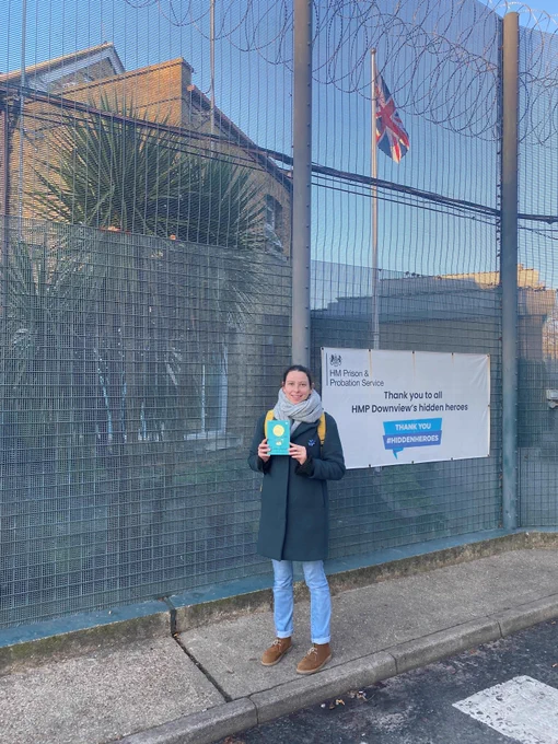 A image of children's poet Kate Wakeling outside HMP Downview after delivering the first Readconnect workshop with the women based on her book 'Moon Juice.'