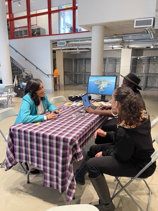 Minister Anand speaks with members of Ethọ́s Lab