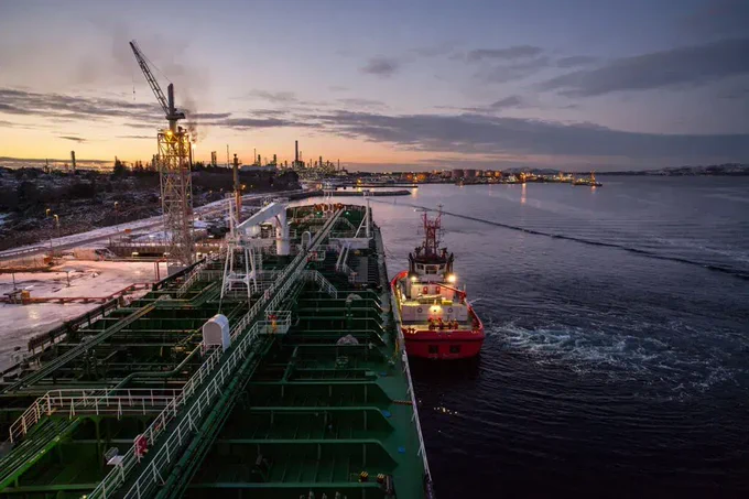 An oil tanker being moored at the Mongstad oil terminal and refinery in Norway. Credit: Ola Moen / Alamy Stock Photo.
