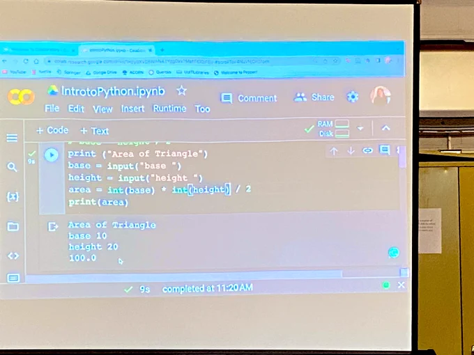 Python code to calculate and show the value of the area of a triangle.