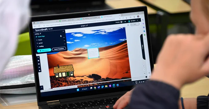A student using SpaceDraft on their laptop.