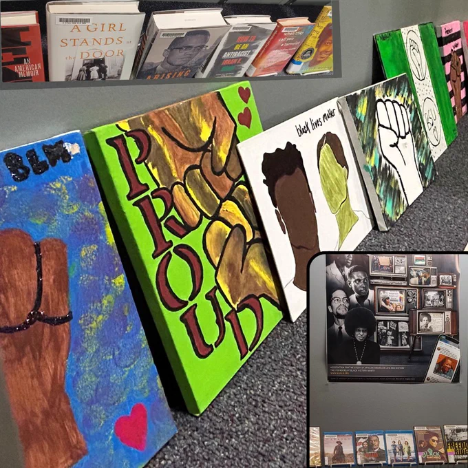 art by Black Student Union, DVDs and books on display