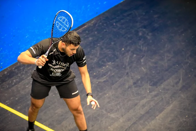 Moustafa El Sirty serves during his second round match at the Squash On Fire Open