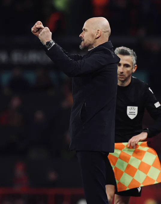 Erik ten Hag celebrates a United goal.
