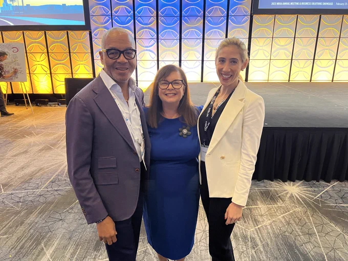 Photo of Heather Hoerle with EMA Trustees Dallas Joseph and Claire Goldsmith after receiving her NBOA award