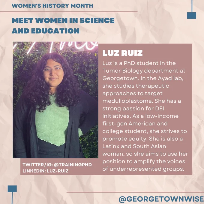 pink canvas with blue words “Women’s History Month” and “Meet Women in Science and Education” on top right. On the left is a picture of Luz, a Latinx and South Asian woman, with her bio in white words on the right. On the bottom below her picture is her social media info- Twitter/IG: @TrainingPhD, LinkedIn: Luz-Ruiz.