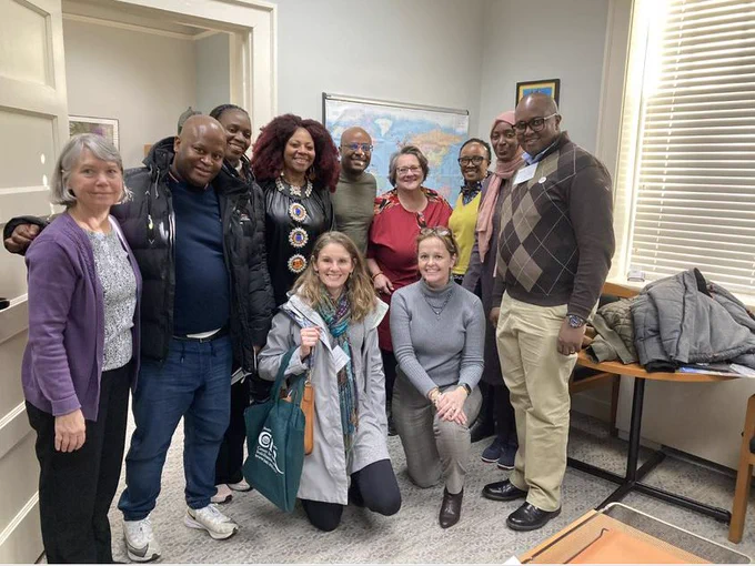 Eleven people smile and pose for a picture inside. Caption: YALI Delegates with Dr. Heather Coltman (JMU Academic Affairs Provost), Dr. Jen Taylor, Dr. Suzanne Fiederlein, USAID Colleague, Amy Czajkowski.