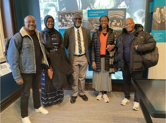 Five people smile and pose for a picture in inside. Caption: YALI Delegates with Dr. David Owusu-Ansah, History Department Professor, JMU.