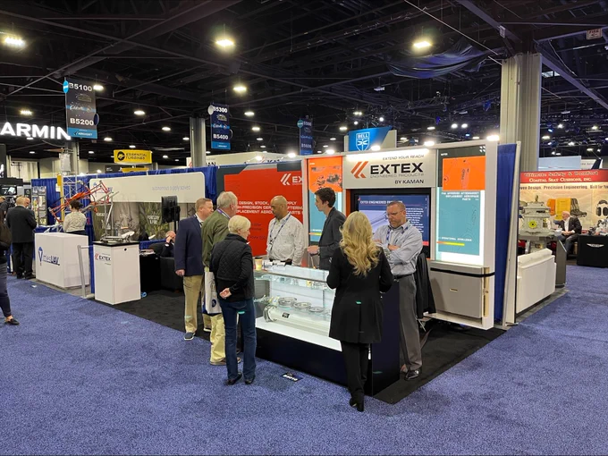 EXTEX working their HAI Heli-Expo Booth