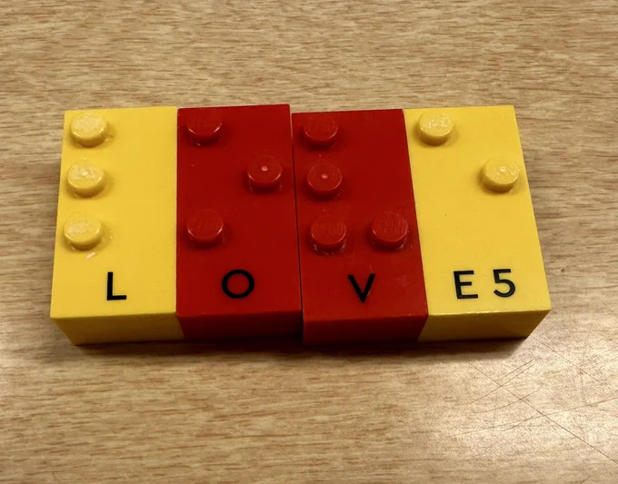 Love spelled with braille bricks.