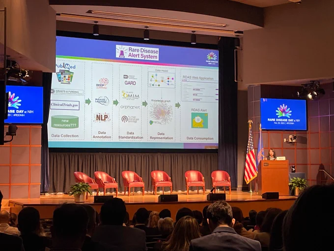 Photo of the Rare Disease Alert System on a slide at Rare Disease Day at NIH 2023.
