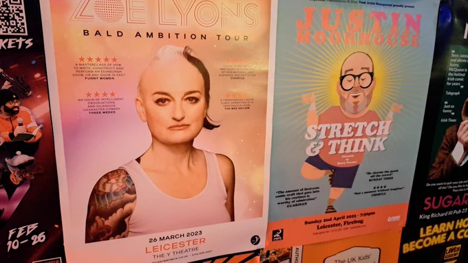 Posters for Zoe Lyons Bald Ambition Tour (Sun 26th March The Y Theatre) and Justin Moorhouse Stretch & Think (Sun 2nd April Firebug) on the walls at The Big Difference.