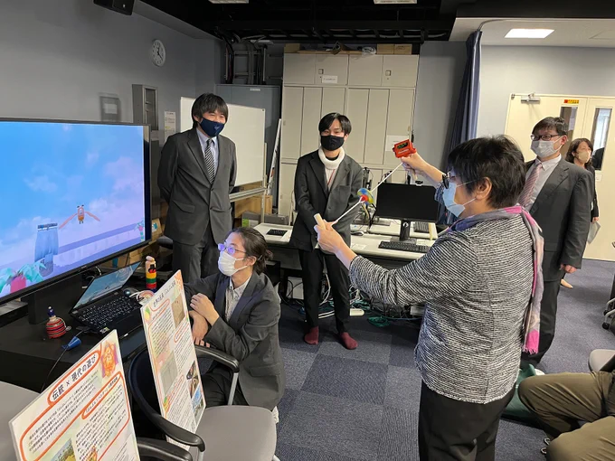 Dr. Cen Huang trying out a beta game at Ritsumeikan Center for Game Studies