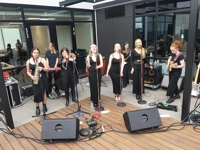 The local soul band and all female group Sweethearts performing to celebrate the Geelong opening. 