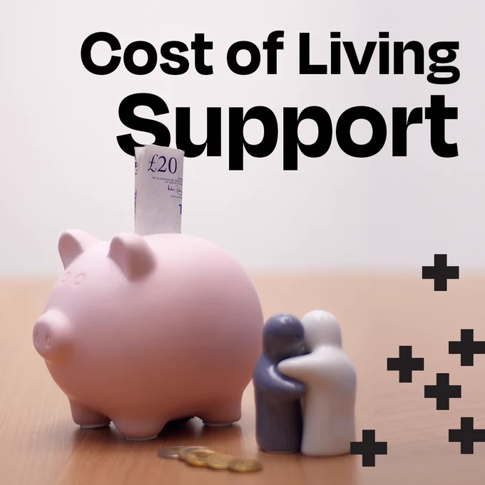 a piggy bank with a £20 note sticking out of it, with text that reads 'Cost of Living support' above.