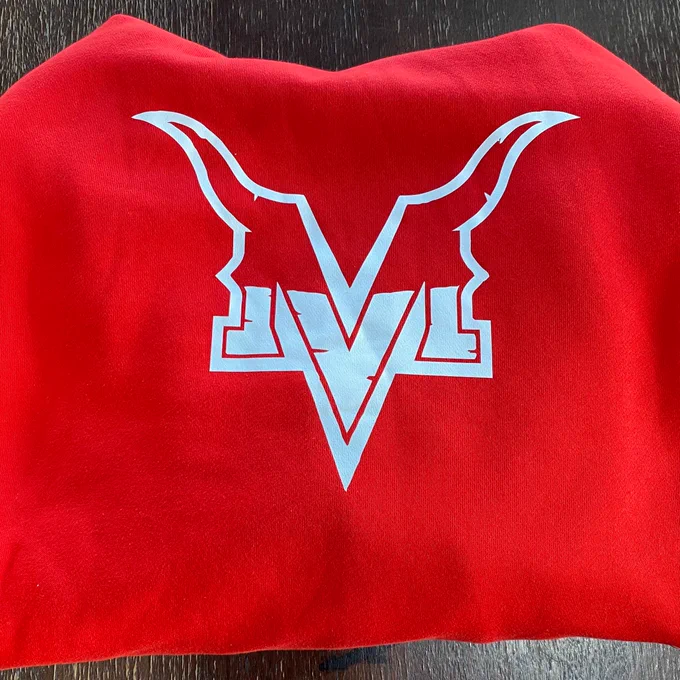 A folded red hoodie with the Murdoch Vikings logo in white on the front.