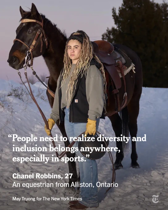 Chanel Robbins stands next to her horse holding the reins in one hand and her helmet in the other. She has dreadlocks and wears a black vest and jeans. A quote from her reads: "People need to realize diversity and inclusion belongs anywhere, especially in sports." Photo credit: May Truong for The New York Times.