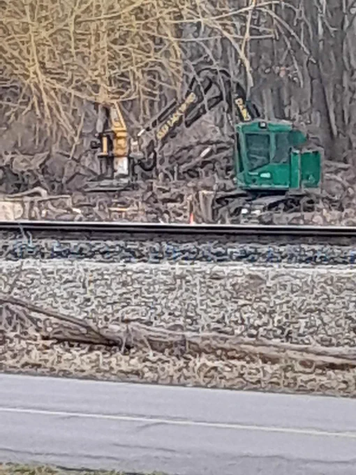 Picture in Akron Ohio of heavy construction equipment that started tearing down trees at the White Pond Dr development. Trees are being cut down at the White Pond Dr property while there is an open legal case against the city questioning the legality of the land sale. This is wrong. This is unethical. This may be illegal. @/savewhitepond on instagram is the best place to follow & help