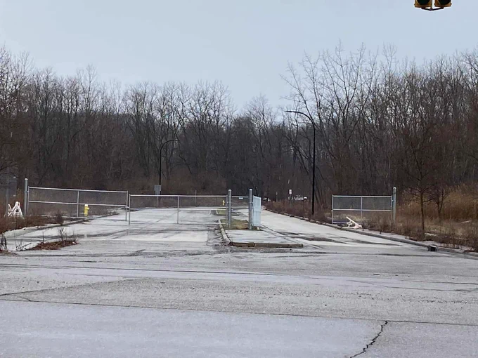 Picture of new fencing at the White Pond Dr development in Akron. Trees are being cut down at the White Pond Dr property while there is an open legal case against the city questioning the legality of the land sale. This is wrong. This is unethical. This may be illegal. @/savewhitepond on instagram is the best place to follow & help
