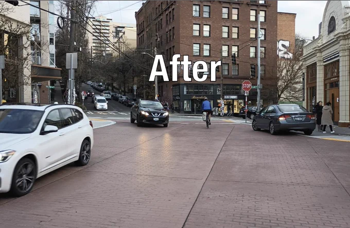 Picture from @typewriteralley of the same street after it was improved this year as a curb less street with lots of cars on it. A few people are being dropped off from one of the cars. A person in the distance bikes. No one sits at tables at this street. It's pretty sad in comparison to the before photo.