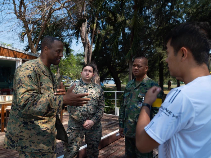 U.S. Navy Lt. Leotra West (far left), Chaplain (FMF) for Combat Logistics Regiment 3, 3rd Marine Logistics Group, meets with Royal Thai Marine Corps Chaplain Cmdr. Surachet Thongman (center right) during Exercise Cobra Gold at Camp Jessada, Kingdom of Thailand, March 1, 2023. The bilateral chaplains’ meeting discussed topics to establish connections and strengthen community relations between United States Forces and Royal Thai Forces. Cobra Gold, now in its 42nd year, is a Thai-U.S. co-sponsored training event that builds on the longstanding friendship between the two allied nations and brings together a robust multinational force to promote regional peace and security in support of a free and open Indo-Pacific. 

U.S. Marine Corps photo by Cpl. Madison Santamaria