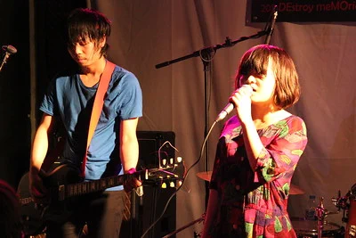 Zo and Atom of Chinese rock band Hedgehog on stage at Yuyintang in Shanghai in 2011.