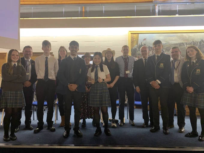Clyde House pupils and staff, as well as the Rector, gathered on stage in the Senior School Assembly Hall.