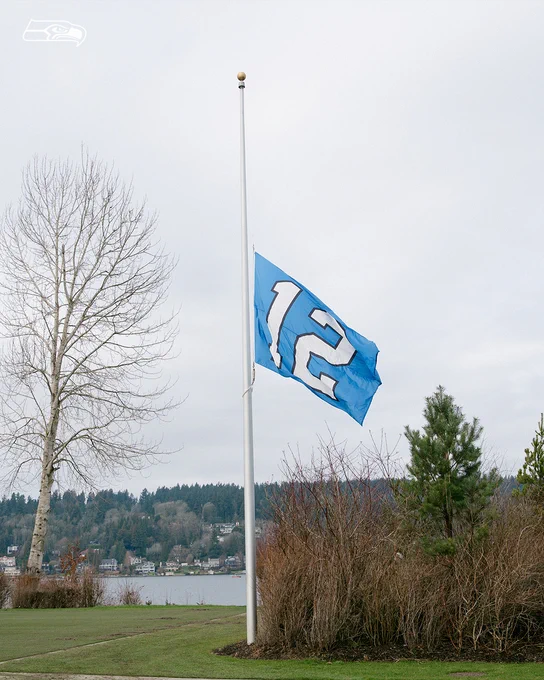 A photo of the flag at half mast. 