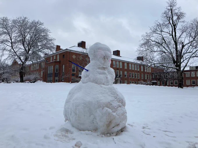 Picture of a snowman outside of Hartwell Hall.
